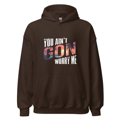 Dark Chocolate You Ain't Gon Worry Me® Sunset Edition Unisex Hoodie featuring warm sunset-inspired artwork on a premium fleece hoodie designed for everyday comfort, confidence, and peace over pressure.