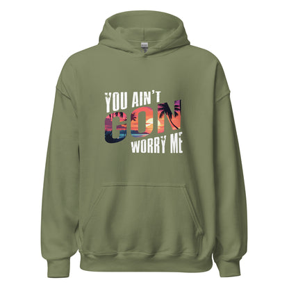 Military Green You Ain't Gon Worry Me® Sunset Edition Unisex Hoodie featuring warm sunset-inspired artwork on a premium fleece hoodie designed for everyday comfort, confidence, and peace over pressure.
